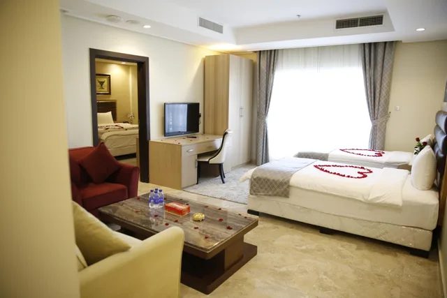 غرفة ديلوكس عائلية بإطلالة على المدينة، Adams Hotel 1/5