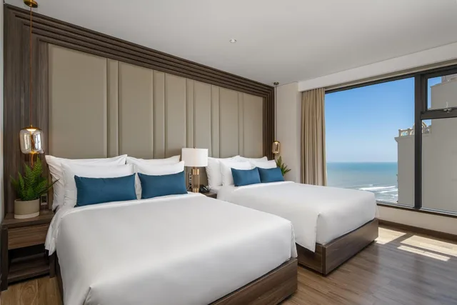 غرفة تنفيذية عائلية بإطلالة جزئية على البحر، Minh Toan Safi Ocean Hotel 3/8