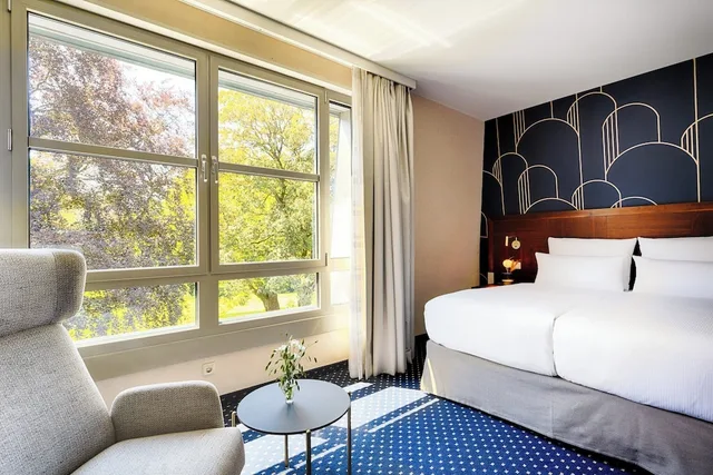 غرفة ديلوكس بسرير كينج، Courtyard By Marriott Bochum Stadtpark 3/10