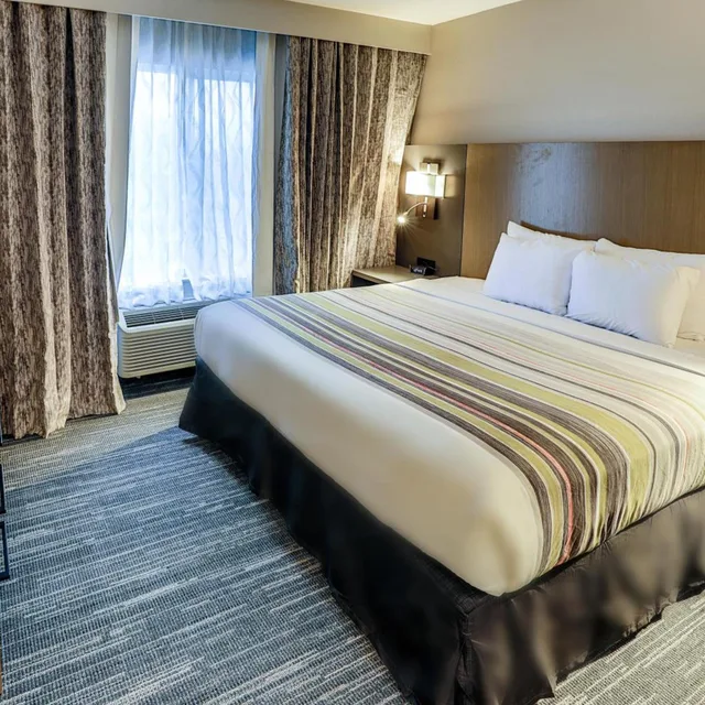Suite, King Bed, Sofa, Country Inn & Suites By Radisson Nashville Airport TN 2/9