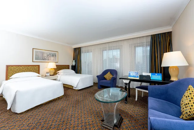 غرفة تنفيذية بسرير كوين وسريرين منفصلين، Grand Skylight Hotel Royal 6/6