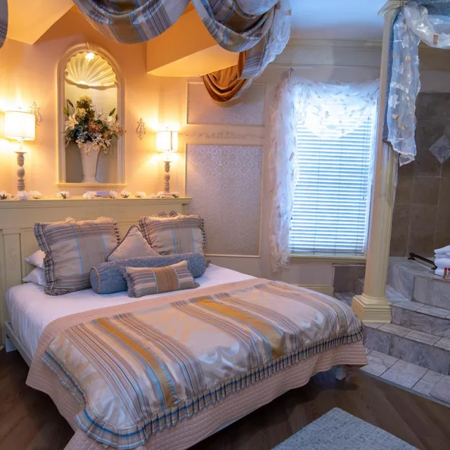 غرفة بسرير مزدوج بشرفة، Anniversary Inn - 5th South 1/3