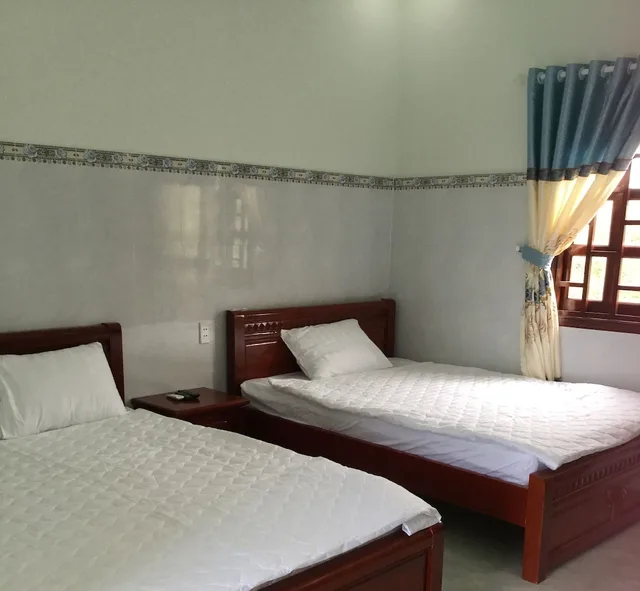 غرفة أساسية بسريرين كوين بإطلالة على المسبح، Hotel Nguyen Toan 3/8