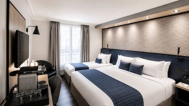 غرفة ديلوكس بسرير كينج وسرير فردي، Best Western Plus Opera Batignolles 2/10