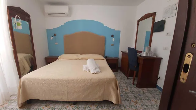 غرفة اقتصادية بسرير مزدوج أو سريرين منفصلين، Hotel Amalfi 1/3