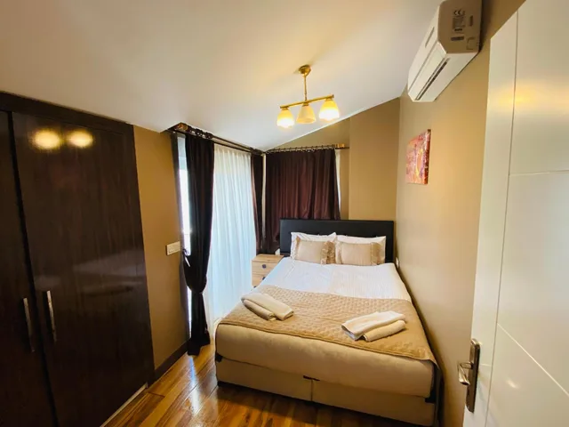 شقة بريميوم بشرفة بـ3 غرف نوم، Royal Loft Suit 7/10