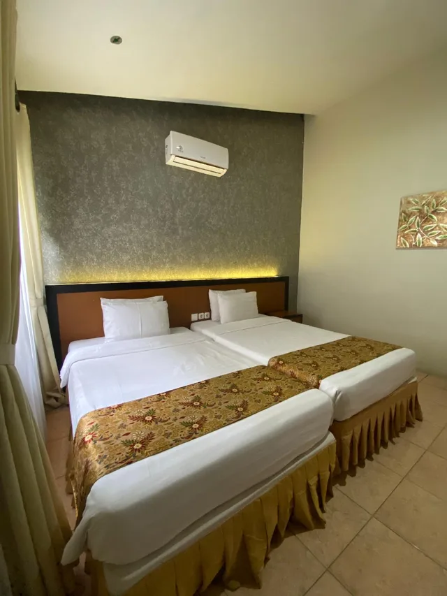 Lily, Twin Beds، Grand Ussu Hotel And Convention 2/2