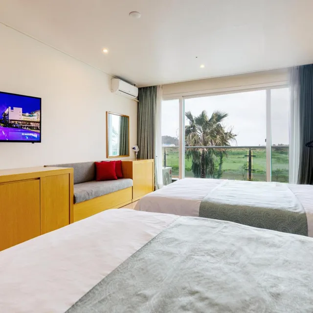 غرفة سوبيريور بسريرين منفصلين بإطلالة على الحديقة، The Four Graces Resort 7/7