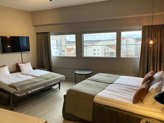 Family, King Bed, Sofa, Kitchenette, Skyline Airport Hotel 1/4