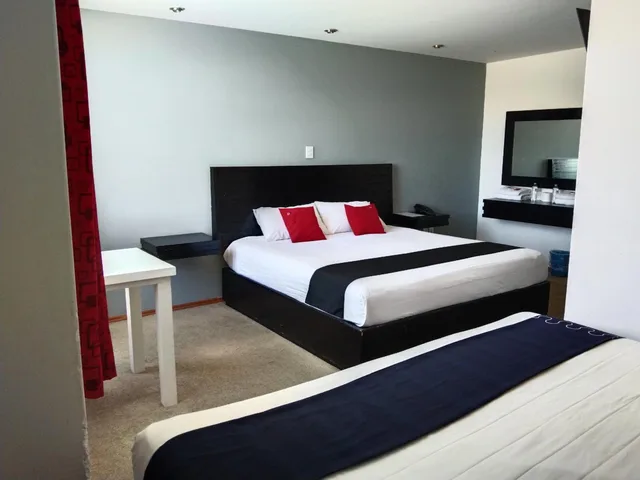 غرفة ديلوكس بسريرين، Capital O Hotel Euro Confort Pachuca 3/9