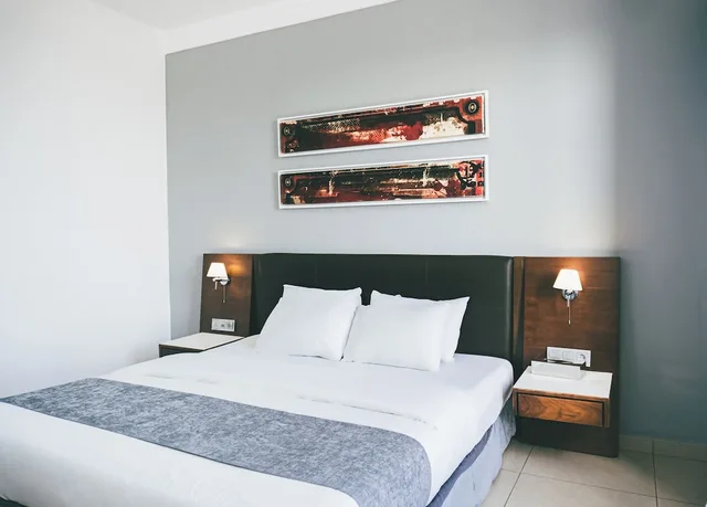 غرفة كومفورت مفردة بسرير كوين، The Avenue Suites 1/5