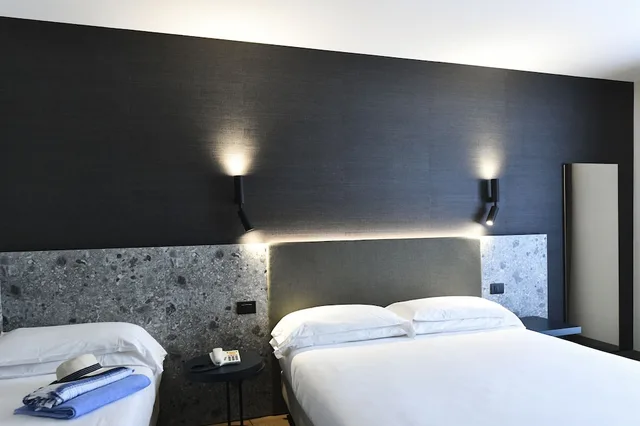 غرفة سوبيريور ثلاثية بسرير مزدوج وسرير فردي، Hotel Eden 2/4