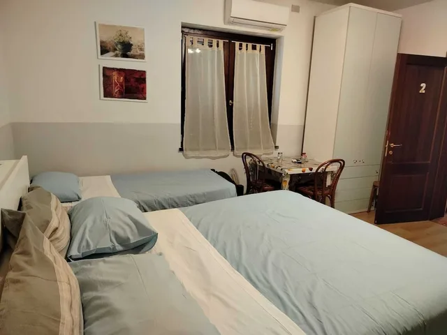 غرفة رباعية بسرير كوين وسريرين منفصلين، Il Cielo Di Lucio 1/10