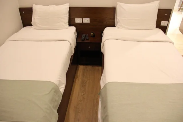 غرفة ديلوكس بسرير مزدوج أو سريرين منفصلين، Miramar Downtown Hotel 5/9