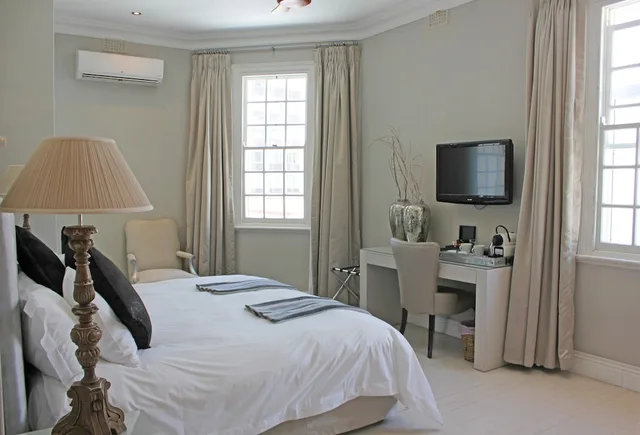 غرفة ديلوكس بسرير كينج بحوض استحمام، Long Street Boutique Hotel 1/4