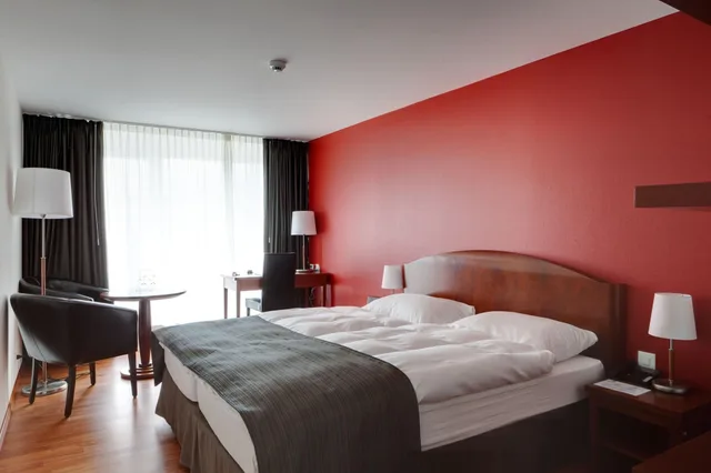 غرفة تنفيذية، Hotel Rallye & Entrees aux Bains de la Gruyere 1/3