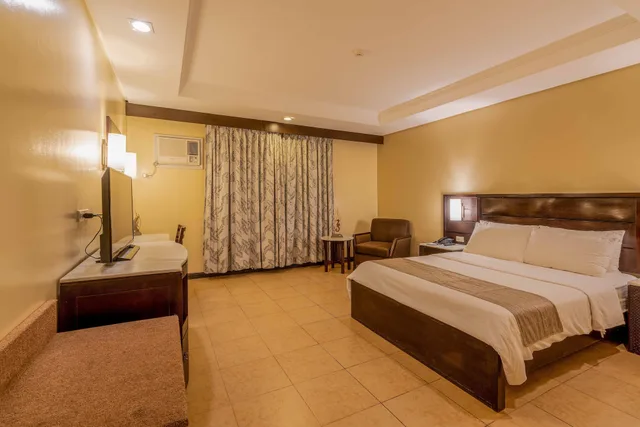 غرفة عائلية بسرير كينج وسريرين كوين، Coron Westown Resort 2/10