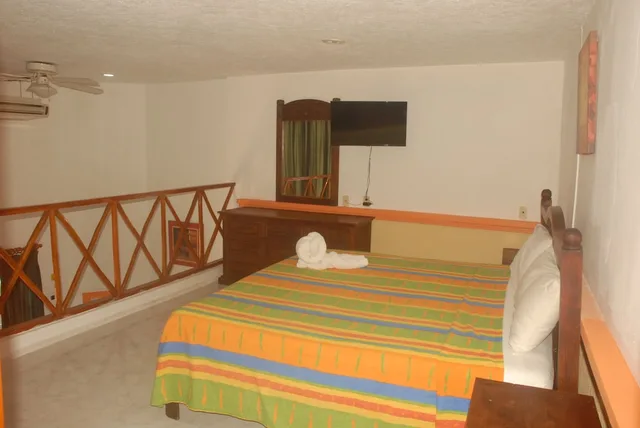 غرفة ديلوكس رباعية بسريرين مزدوجين بغرفة نوم واحدة، Hotel Vista Caribe 3/4
