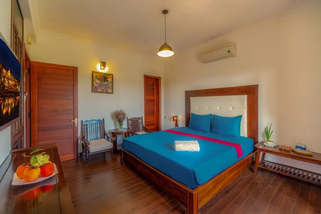 غرفة ديلوكس بسرير مزدوج بإطلالة على النهر، Golden Peach Villa Hoi An 2/7