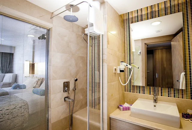 غرفة قياسية بسريرين منفصلين بإطلالة على الحديقة، Melas Resort Hotel Side 5/5
