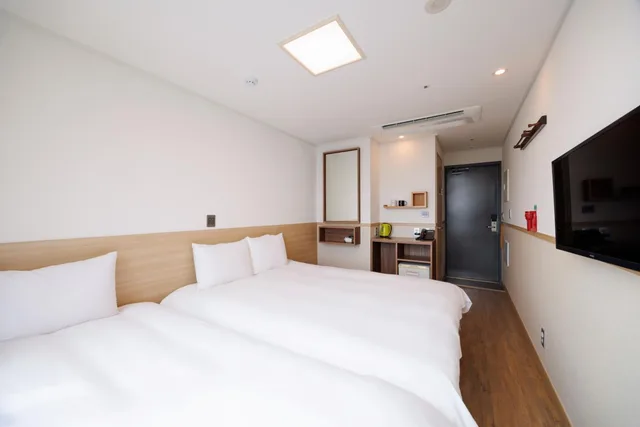غرفة عائلية بسريرين منفصلين بإطلالة على المدينة، Hotel Kenny Seogwipo 3/9