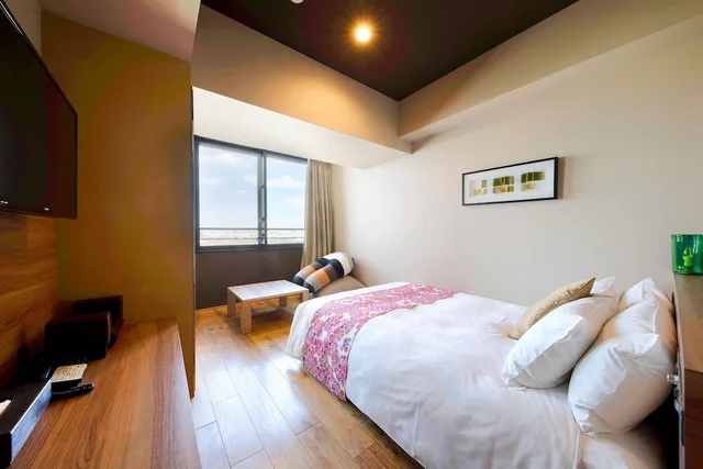 Double Bed, Club Floor، Ryukyu Onsen Senagajima Hotel 1/8