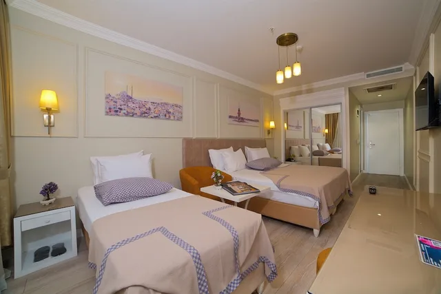 غرفة قياسية ثلاثية بسرير مزدوج وسرير فردي، Villa Vanilla 1/2
