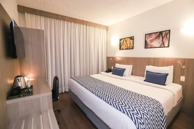 غرفة فاخرة بسرير كينج، Ramada by Wyndham Campinas Viracopos 5/8