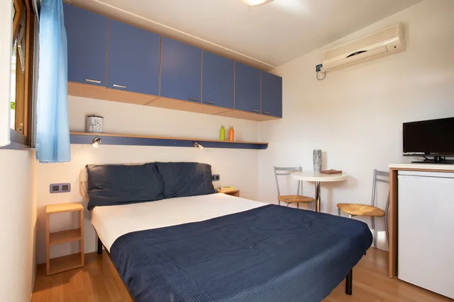 Mobile Home, Double Bed، Camping Village Baia Blu La Tortuga 1/2