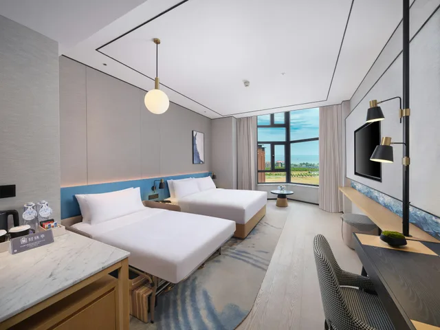 غرفة بسرير كينج، Hilton Garden Inn Huludao Longxing Road 1/2