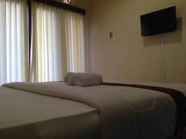 غرفة ديلوكس بسرير كوين بغرفة نوم واحدة، Sari Buana Bed Breakfast 7/10