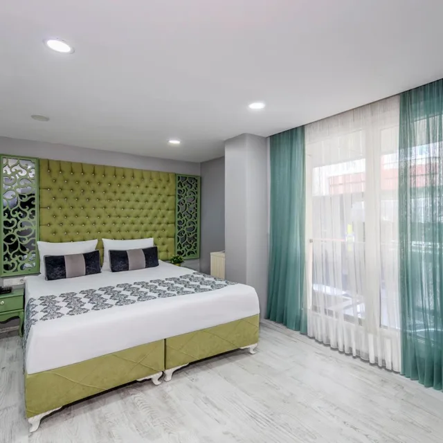 غرفة ديلوكس بسرير مزدوج، Green Garden Hotel 2/9