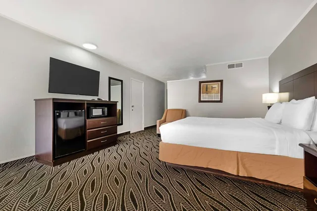غرفة بسرير كينج، Best Western Red Carpet Inn 1/4