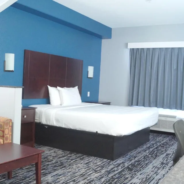 غرفة بسرير كينج، Magnolia Inn And Suites 1/6