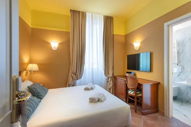 غرفة اقتصادية بسرير كوين، Hotel Nuvo 3/6