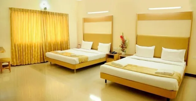 غرفة قياسية رباعية بسريرين كوين، HOTEL RAJADHANE 2/9