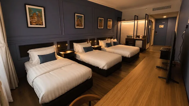 غرفة عائلية رباعية بسرير كوين وسريرين منفصلين بإطلالة على المدينة، Kuala Lumpur International Hotel 3/5