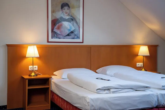 غرفة كومفورت رباعية بسريرين كوين، Hotel Glockenhof Eisenach 6/7
