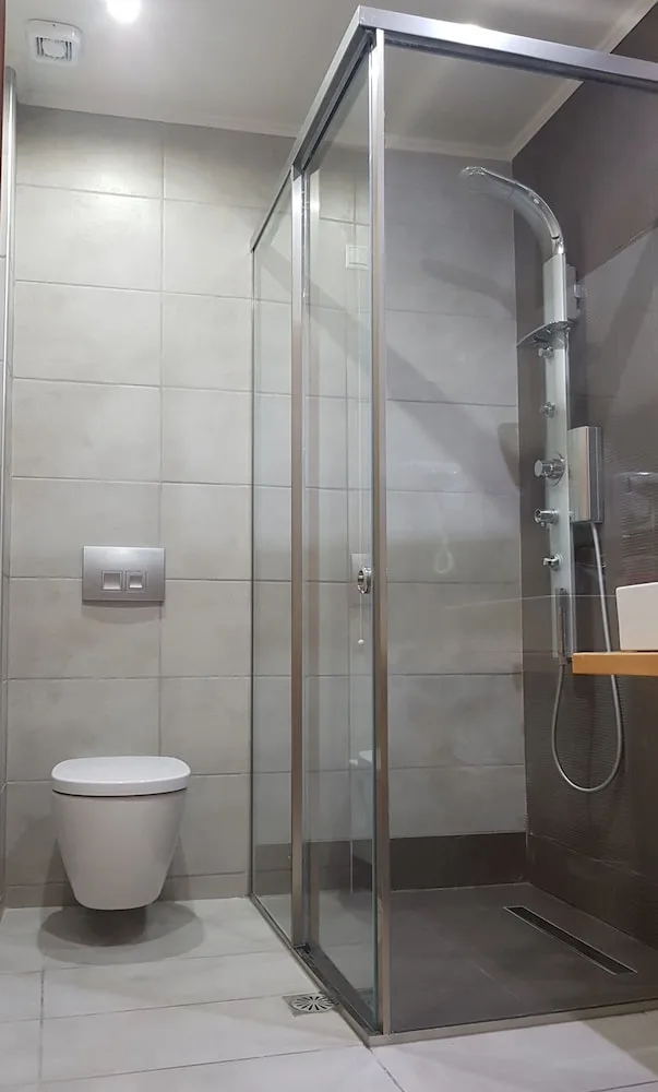 Room, Triple, Double Bed, Sofa, Grand Theoni Hotel Suites And Spa 2/6