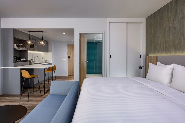 جناح بسرير كينج بغرفة نوم واحدة مع أريكة، Residence Inn Paris Charles de Gaulle Central Airport 1/4
