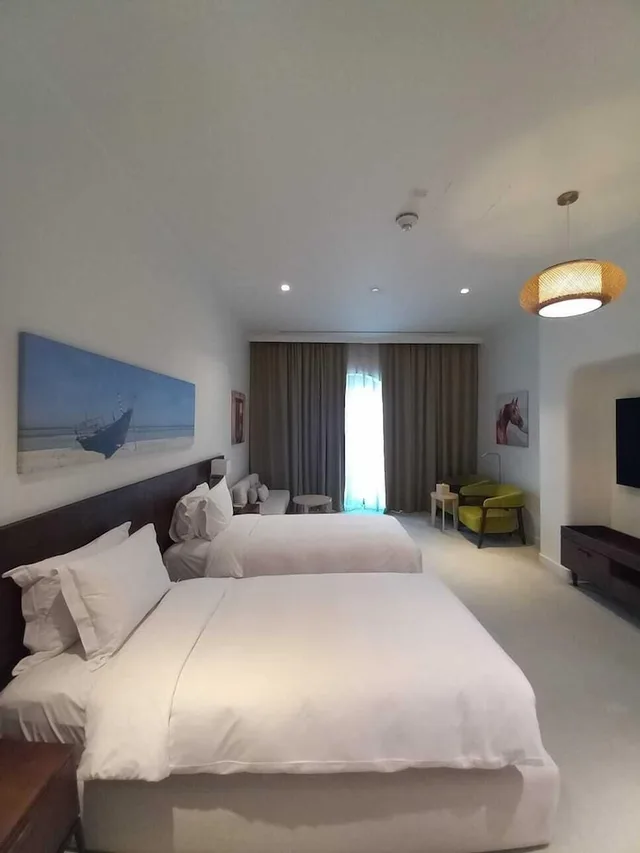 غرفة ديلوكس بسرير كينج، Mina Hotel and Residences 1/6