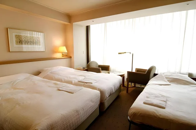 غرفة بسريرين منفصلين، Breezbay Hotel Resort And Spa 1/2