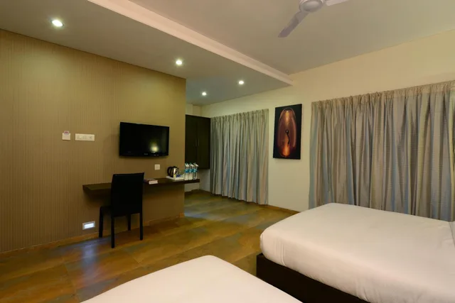 غرفة كلاسيكية عائلية بسرير فردي، Matrix Inn Shirdi 1/1