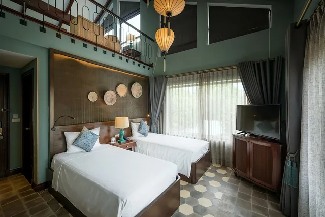 جناح دوبلكس بسرير كينج وسريرين منفصلين بشرفة، Aira Boutique Hoi An 4/6