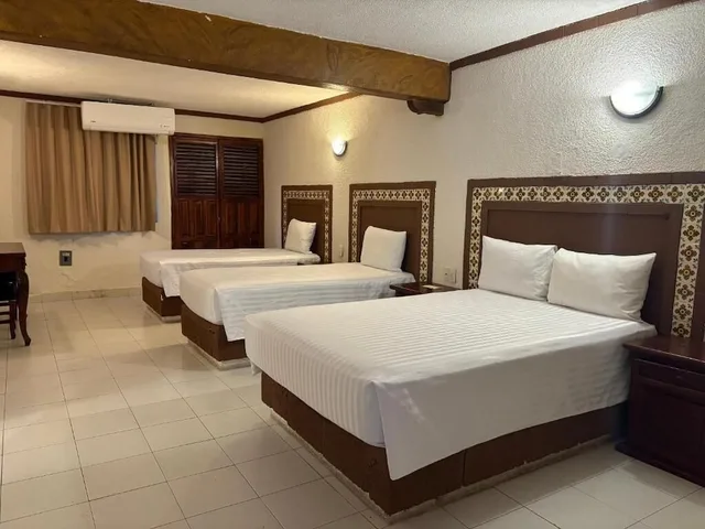 غرفة سوبيريور ثلاثية بسرير مزدوج وسريرين منفصلين، Suites Cancun Center 3/6