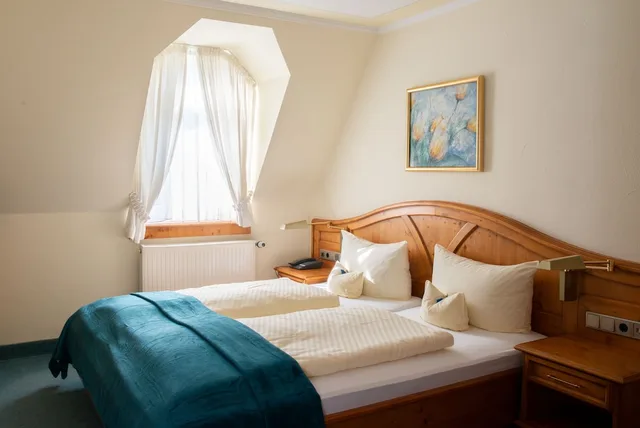 غرفة كومفورت ثلاثية بسرير كوين، Sporthotel Landhaus Wacker 1/1