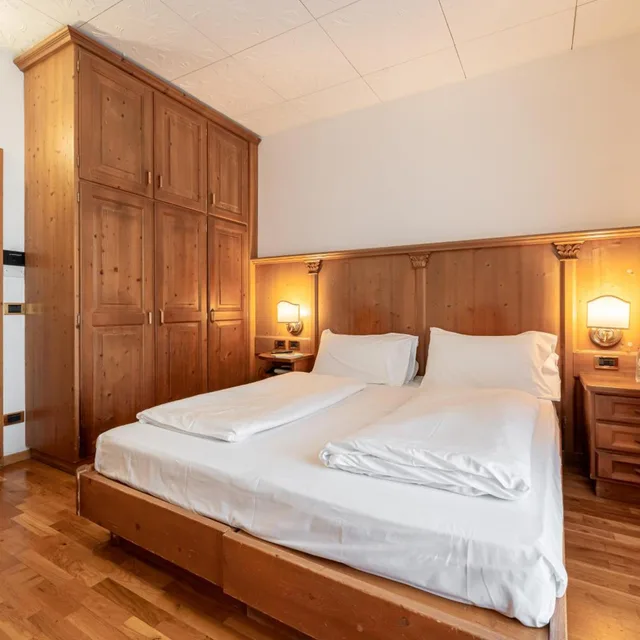 غرفة اقتصادية بسرير مزدوج أو سريرين منفصلين، Schloss Hotel & Club Dolomiti 1/10
