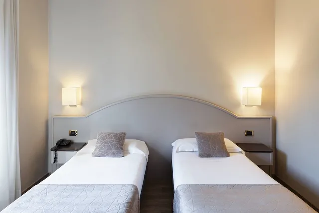 1 Bedroom, Triple, 1 Double and 1 Single Bed, Mokinba Hotel Baviera 6/9