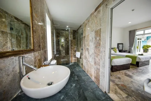 غرفة ديلوكس بسرير كوين وسرير فردي، Lucky Leaf Villa 5/5