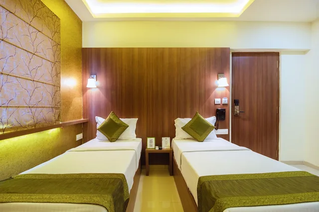 غرفة قياسية بسريرين منفصلين، Treebo Arastu Inn 5/7